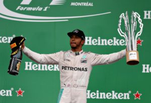 MONTREAL, QC - JUNE 12: Lewis Hamilton of Great Britain and Mercedes GP celebrates winning the Canadian Formula One Grand Prix at Circuit Gilles Villeneuve on June 12, 2016 in Montreal, Canada. Mark Thompson/Getty Images/AFP == FOR NEWSPAPERS, INTERNET, TELCOS & TELEVISION USE ONLY ==